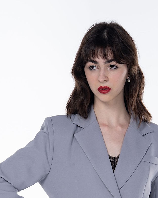 Editorial look with a classic red lip and smoky liner